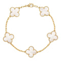 Gold bracelet with transparent clovers